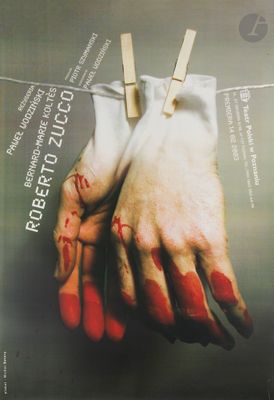 a poster for a movie with bloody hands hanging on a clothes line