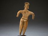an image of a statue of a woman standing on a wooden base