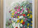 une peinture à l'huile représentant un bouquet de fleurs dans un cadre doré