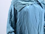 an image of a woman ' s blue dress on a mannequin