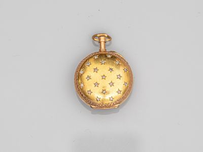 an image of a gold and diamond pocket watch on a white surface