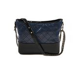 a black and blue purse with a chain strap