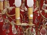 an image of a chandelier with five lights hanging from it ' s arms