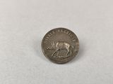 une petite pièce d'argent sur laquelle est représenté un taureau
