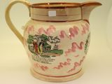 a small pitcher with a picture on it on a table