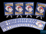 several pokemon cards are on display on a black background