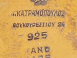a close up of a sign on the side of a building