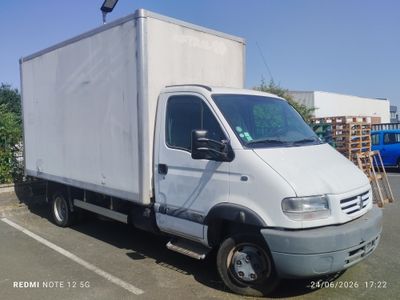 a white truck that is parked in a parking lot