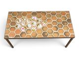 an image of a coffee table with flowers on it