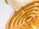 a white and gold light that is on the ceiling