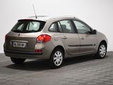 a picture of a silver car parked in a room