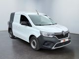 the white van is parked in a white room with a black floor