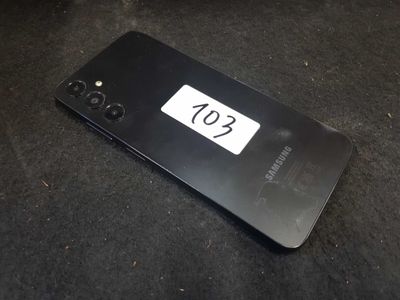 the back of a black samsung phone with a number plate on it