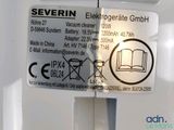 a close up of a sign on the side of a refrigerator
