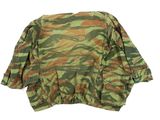 a close up of a camouflage shirt on a white background