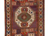 un tapis orné d'un motif représentant un oiseau