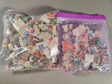 a bag full of stamps sitting on a table