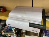 an image of a printer sitting on top of a desk