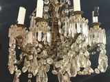 an image of a chandelier hanging from the ceiling in a room