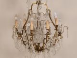 an image of a chandelier with a lot of glass hanging from the ceiling