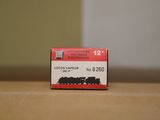 a small box with a train on it sitting on a table