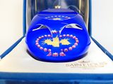 a blue box with a blue and gold clock inside of it