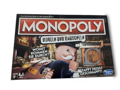 jeu de société « Monopoly » représentant un homme tenant une loupe, une loupe, une loupe, une loupe, une loupe, une loupe, une loupe, une loupe