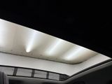 a view of a car ' s interior from inside the vehicle