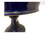 an image of a blue glass cake plate on a stand