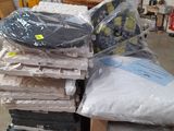 a lot of boxes and bags that are stacked on top of each other