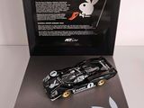 an image of a black toy car with a playboy playboy logo on it