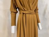 an image of a mannequin wearing a brown dress