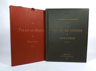 two books sitting next to each other on a white surface
