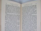 an open book that has a picture of a cat on it
