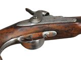 a close up of a rifle on a white background with a white background