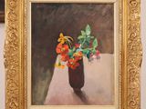 painting of a vase of flowers on a table with a mirror in the background