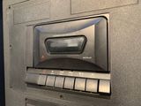 a radio that is on the wall in the room