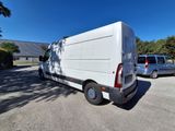 a white van that is parked in the parking lot