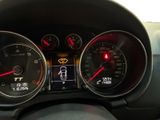 a close up of a car dashboard with various gauges