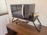 a microwave that is sitting on top of a desk