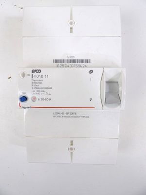 a white electrical device on a white surface