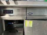 an image of a commercial kitchen with stainless steel appliances