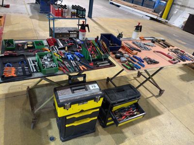 a table with many tools on it in a building