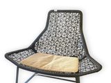 an image of a chair with a cushion on top of it