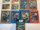 beaucoup de livres accrochés au mur