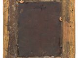 an old wooden picture frame with a tag on it