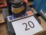 a sign on a table that says 20 on it