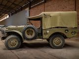 a military vehicle with a tent on the back of it