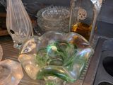 many glass items on the counter in the kitchen