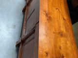 an image of a wooden table with a drawer underneath it